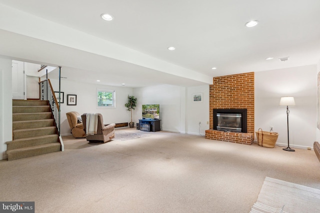 1406 Catlyn Pl, Annapolis, MD 21401 - carpeted living area with recessed lighting, stairway, a fireplace, and baseboards