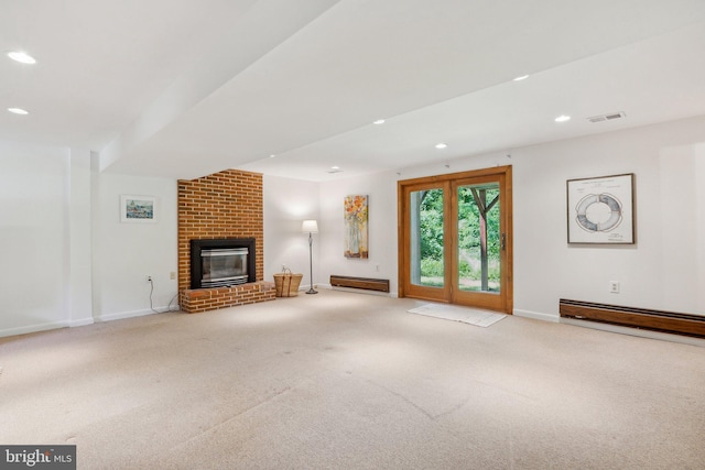 1406 Catlyn Pl, Annapolis, MD 21401 - unfurnished living room with baseboard heating, carpet floors, recessed lighting, a brick fireplace, and baseboards