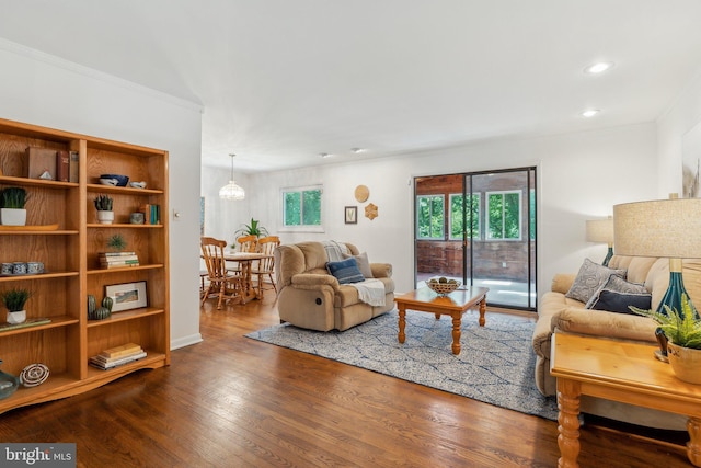 1406 Catlyn Pl, Annapolis, MD 21401 - living room with ornamental molding, wood finished floors, a chandelier, and recessed lighting