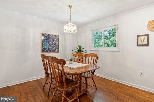 1406 Catlyn Pl, Annapolis, MD 21401 - dining space featuring baseboards, a chandelier, crown molding, and wood finished floors