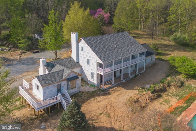 drone / aerial view with a forest view