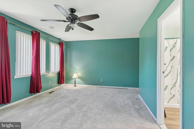 4927 Oxford Ct, Bensalem, PA 19020 - empty room with carpet floors, ceiling fan, visible vents, and baseboards