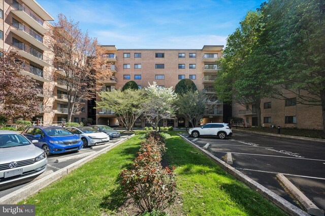 view of property with uncovered parking