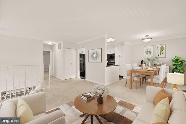 living area featuring baseboards, ornamental molding, light carpet, and visible vents