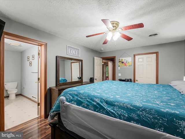 125 Ender Dr, Moorefield, WV 26836 - bedroom with wood finished floors, a textured ceiling, and a ceiling fan