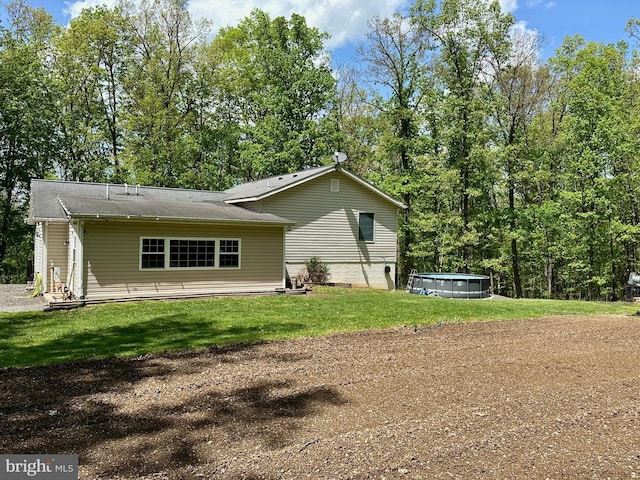 125 Ender Dr, Moorefield, WV 26836 - view of side of property with an outdoor pool and a yard