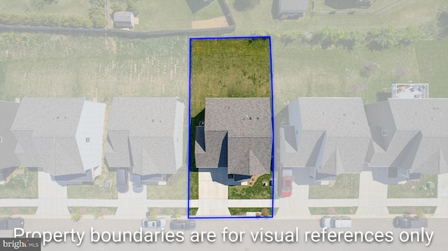 drone / aerial view with a residential view