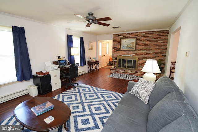 living room featuring ceiling fan, wood finished floors, a baseboard radiator, visible vents, and ornamental molding
