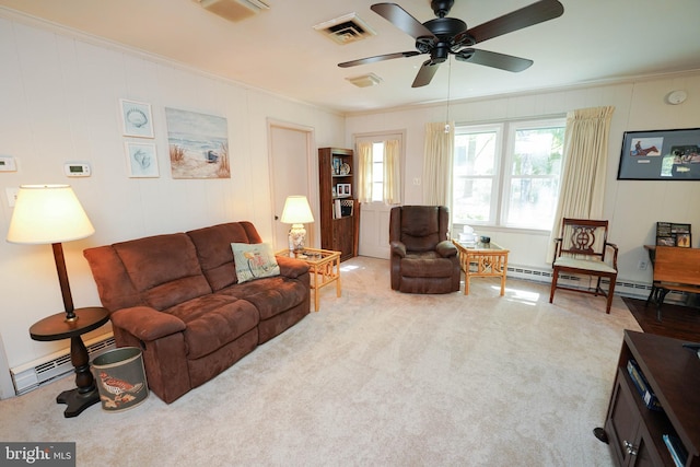 living room with crown molding, carpet floors, ceiling fan, and visible vents