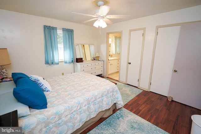 bedroom with connected bathroom, ceiling fan, and wood finished floors