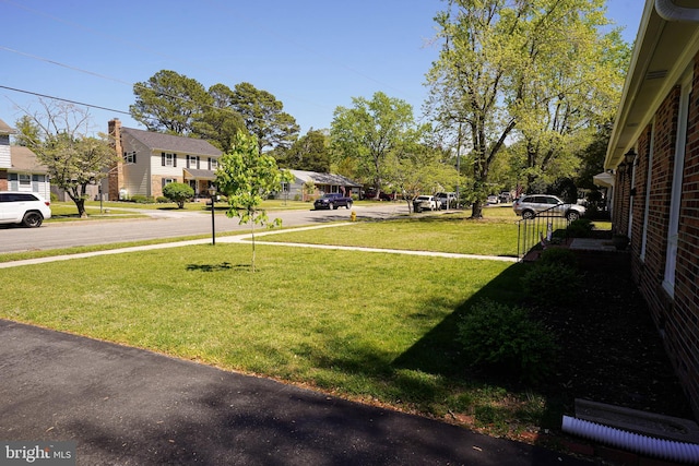 view of yard featuring a residential view