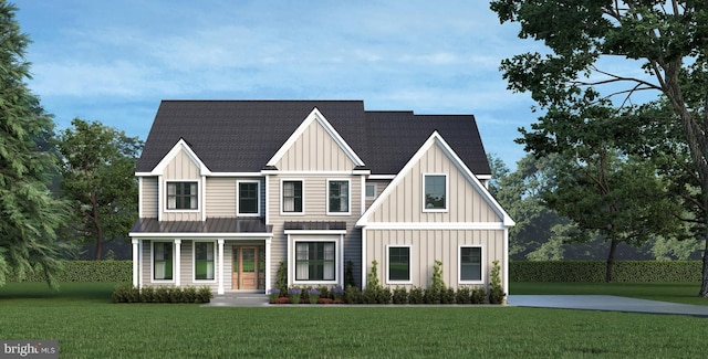 409 W Butler Pike, Ambler, PA 19002 - view of front of property featuring board and batten siding, a front yard, a shingled roof, and a standing seam roof