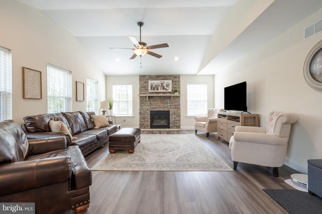 131 Chinaberry Way, Kunkletown, PA 18058 - living area with ceiling fan, visible vents, a fireplace, wood finished floors, and vaulted ceiling