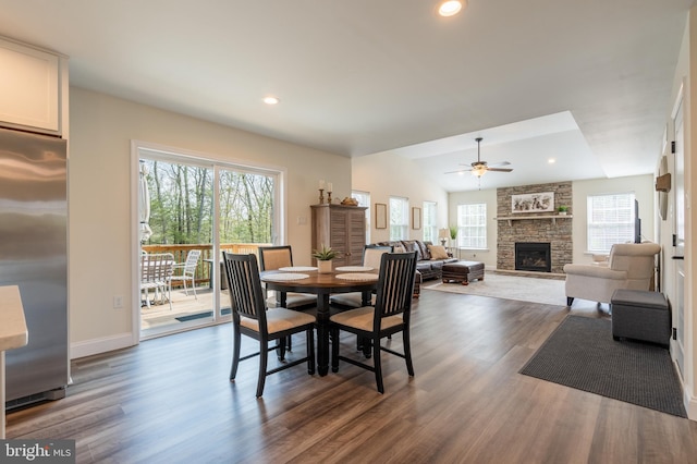 131 Chinaberry Way, Kunkletown, PA 18058 - dining room with dark wood-style flooring, a stone fireplace, baseboards, recessed lighting, and a ceiling fan