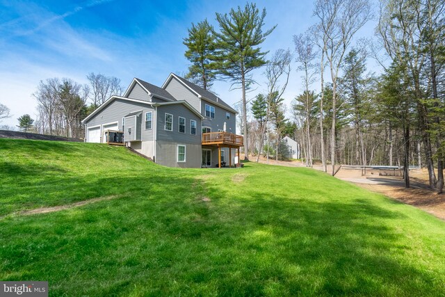 131 Chinaberry Way, Kunkletown, PA 18058 - view of home's exterior featuring a garage, a yard, and a deck