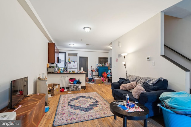 living area featuring hardwood / wood-style flooring