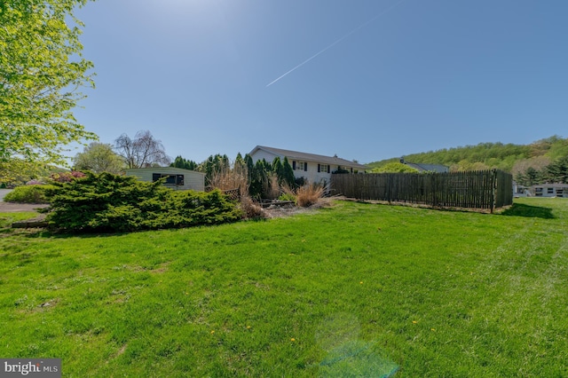 view of yard featuring fence
