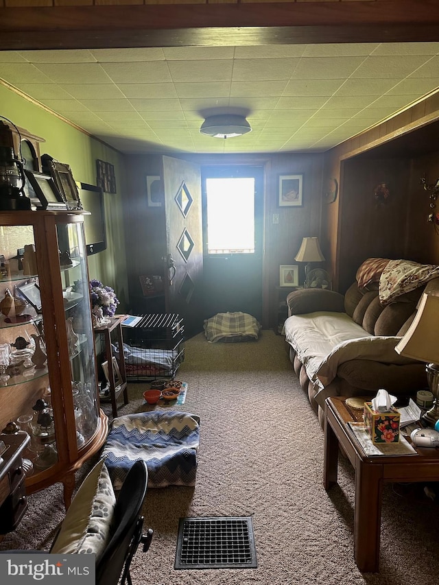 living room featuring carpet floors and visible vents