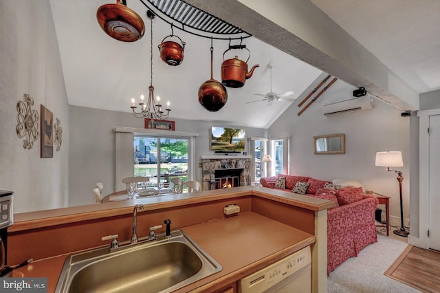116 Snow Ridge Cir, Lake Harmony, PA 18624 - kitchen with a stone fireplace, white dishwasher, vaulted ceiling with beams, a sink, and ceiling fan with notable chandelier