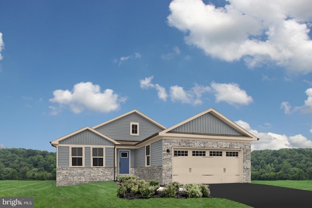craftsman house featuring board and batten siding, an attached garage, a front lawn, and stone siding