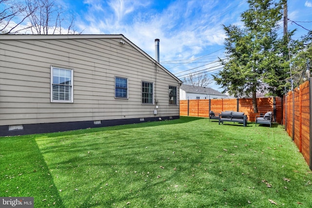 exterior space with a fenced backyard