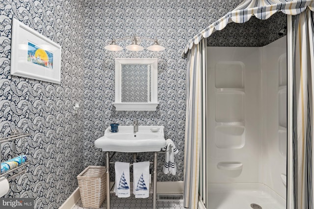 8620 Bozman Neavitt, Saint Michaels, MD 21663 - full bathroom with wallpapered walls, a shower stall, and baseboards