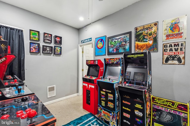 rec room featuring baseboards and visible vents