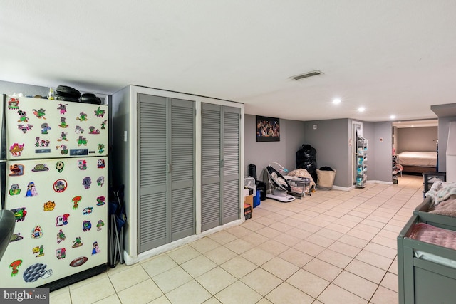 playroom featuring visible vents, recessed lighting, baseboards, and light tile patterned floors