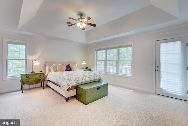 22758 Red Bay Ln, Milton, DE 19968 - bedroom with a raised ceiling, carpet, baseboards, crown molding, and a ceiling fan
