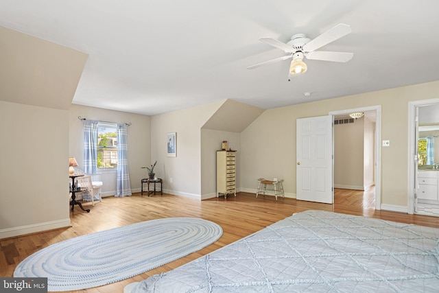 bedroom with baseboards, a ceiling fan, and wood finished floors