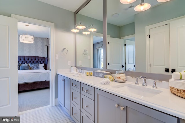 916 Prescott, Berwyn, PA 19312 - bathroom with double vanity, wallpapered walls, and ensuite bathroom