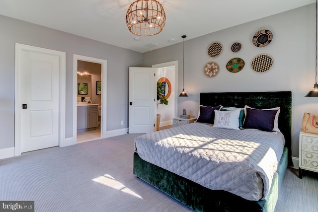 916 Prescott, Berwyn, PA 19312 - bedroom with carpet floors, a chandelier, baseboards, and ensuite bath