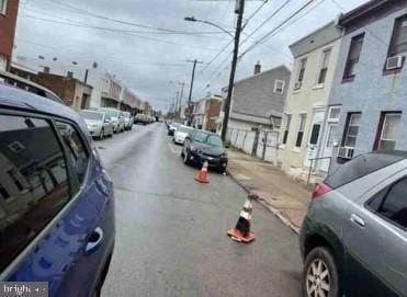 3550 Emerald St, Philadelphia, PA 19134 - view of road featuring street lights and a residential view