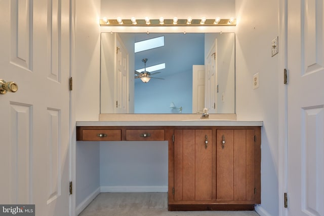 1514 Ravena St Unit D, Bethlehem, PA 18015 - bathroom with vanity, baseboards, ceiling fan, and a skylight