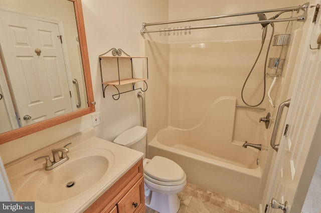 1514 Ravena St Unit D, Bethlehem, PA 18015 - bathroom featuring vanity, stone finish flooring, washtub / shower combination, and toilet