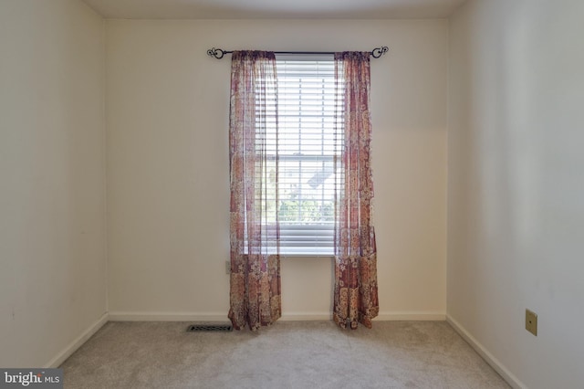 1514 Ravena St Unit D, Bethlehem, PA 18015 - spare room featuring carpet floors, baseboards, and a wealth of natural light