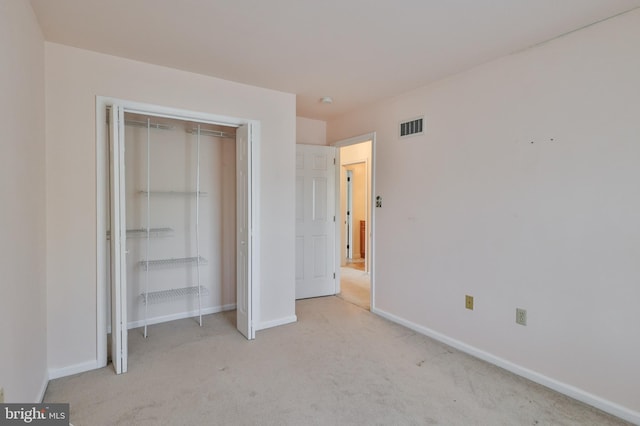 1514 Ravena St Unit D, Bethlehem, PA 18015 - unfurnished bedroom featuring baseboards, carpet, a closet, and visible vents