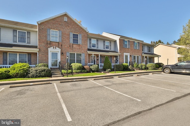 1514 Ravena St Unit D, Bethlehem, PA 18015 - multi unit property with brick siding, uncovered parking, and a residential view