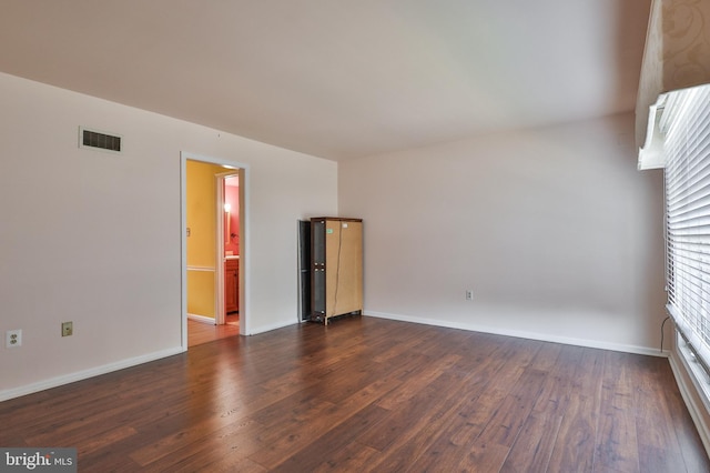 1514 Ravena St Unit D, Bethlehem, PA 18015 - spare room featuring visible vents, dark wood-style flooring, and baseboards