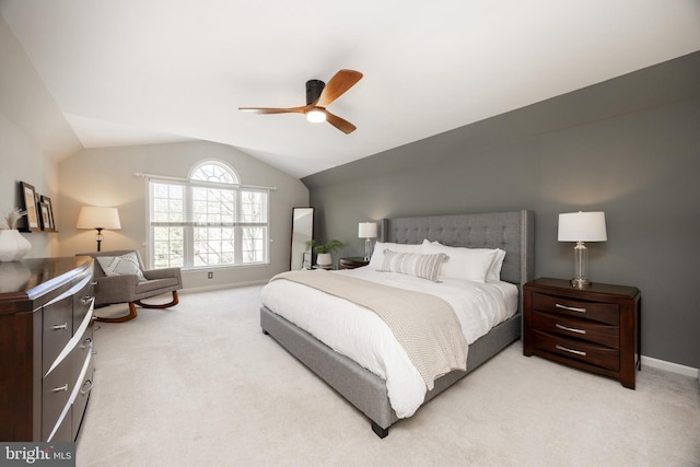 bedroom featuring baseboards, ceiling fan, lofted ceiling, and light carpet