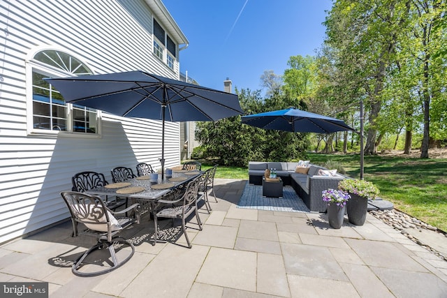 view of patio / terrace featuring outdoor lounge area and outdoor dining area