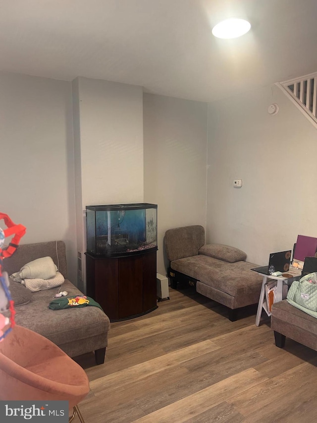 living area with wood finished floors