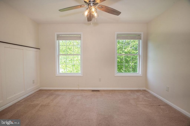 134 Ascot Ct, Bear, DE 19701 - carpeted empty room featuring healthy amount of natural light, a ceiling fan, and baseboards