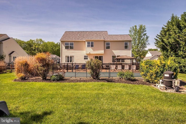134 Ascot Ct, Bear, DE 19701 - back of property featuring a gazebo and a pool