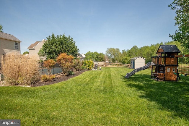 134 Ascot Ct, Bear, DE 19701 - view of yard with a playground, a storage shed, and an outbuilding