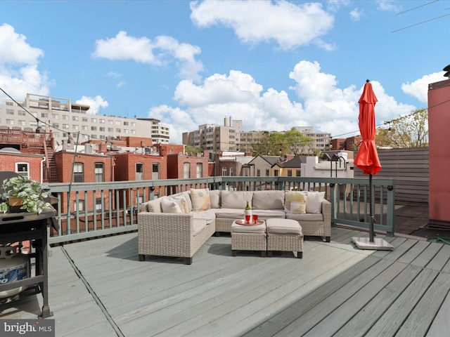 wooden deck featuring outdoor lounge area