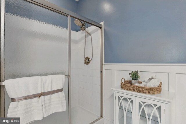 912 Moorings Cir Unit 8, Stevensville, MD 21666 - bathroom with a shower stall and wainscoting