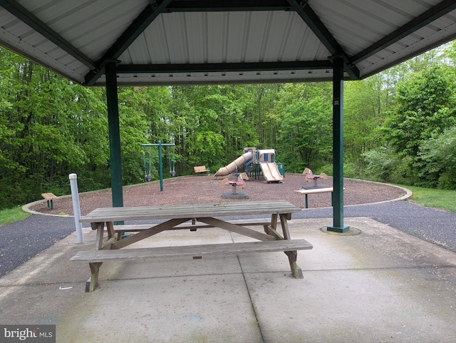 view of property's community featuring a playground