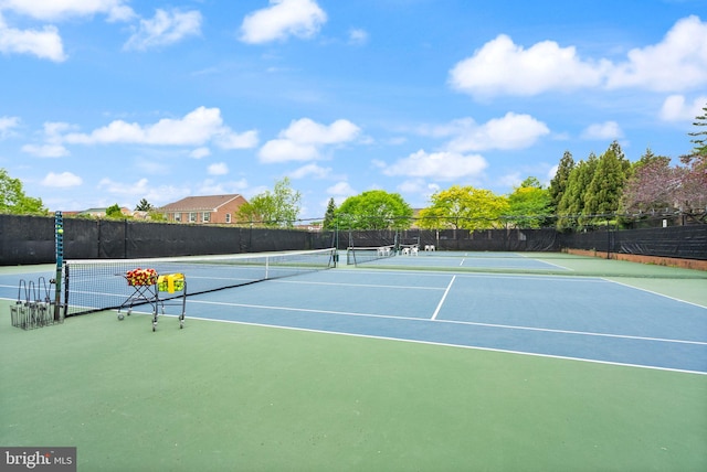 view of sport court with community basketball court and fence