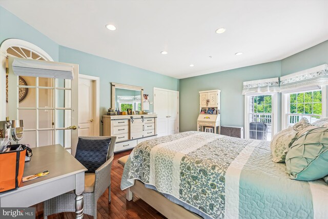bedroom featuring wood finished floors and recessed lighting